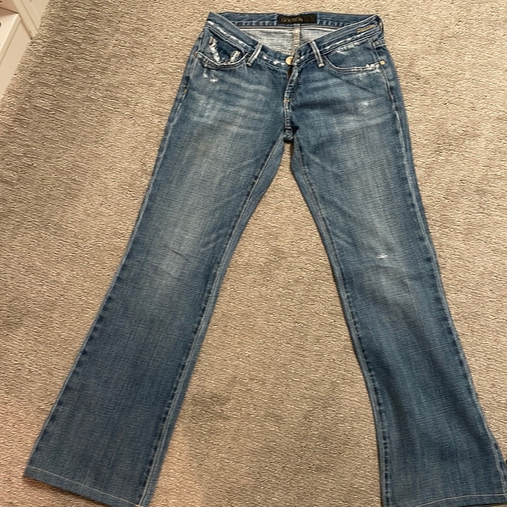 Gold sign worn in denim passion. Size 25